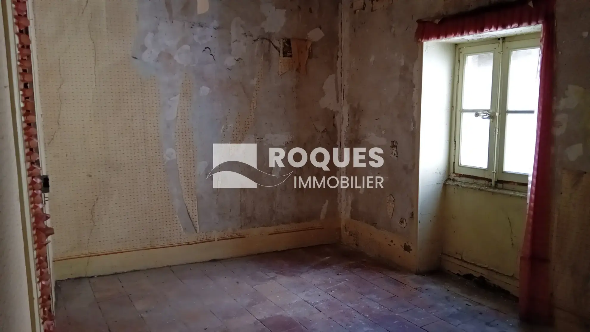 Maison de ville à rénover à Millau - 100m² avec garage et jardin 