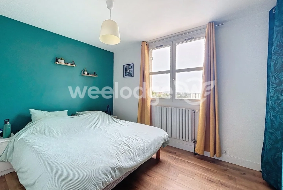 Appartement F2 de 57 m² à Cergy Les 12 Colonnes avec parking, cave et balcon 