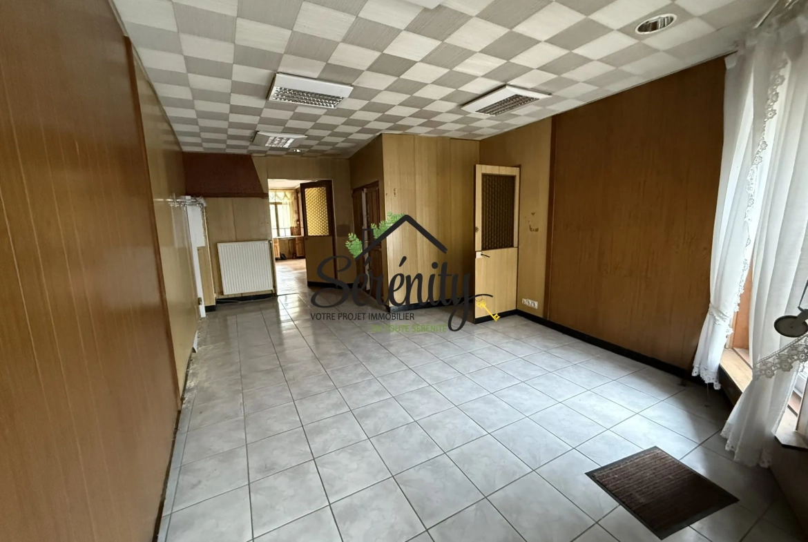 Maison de ville semi-individuelle avec potentiel à Solesmes de 145 m² 