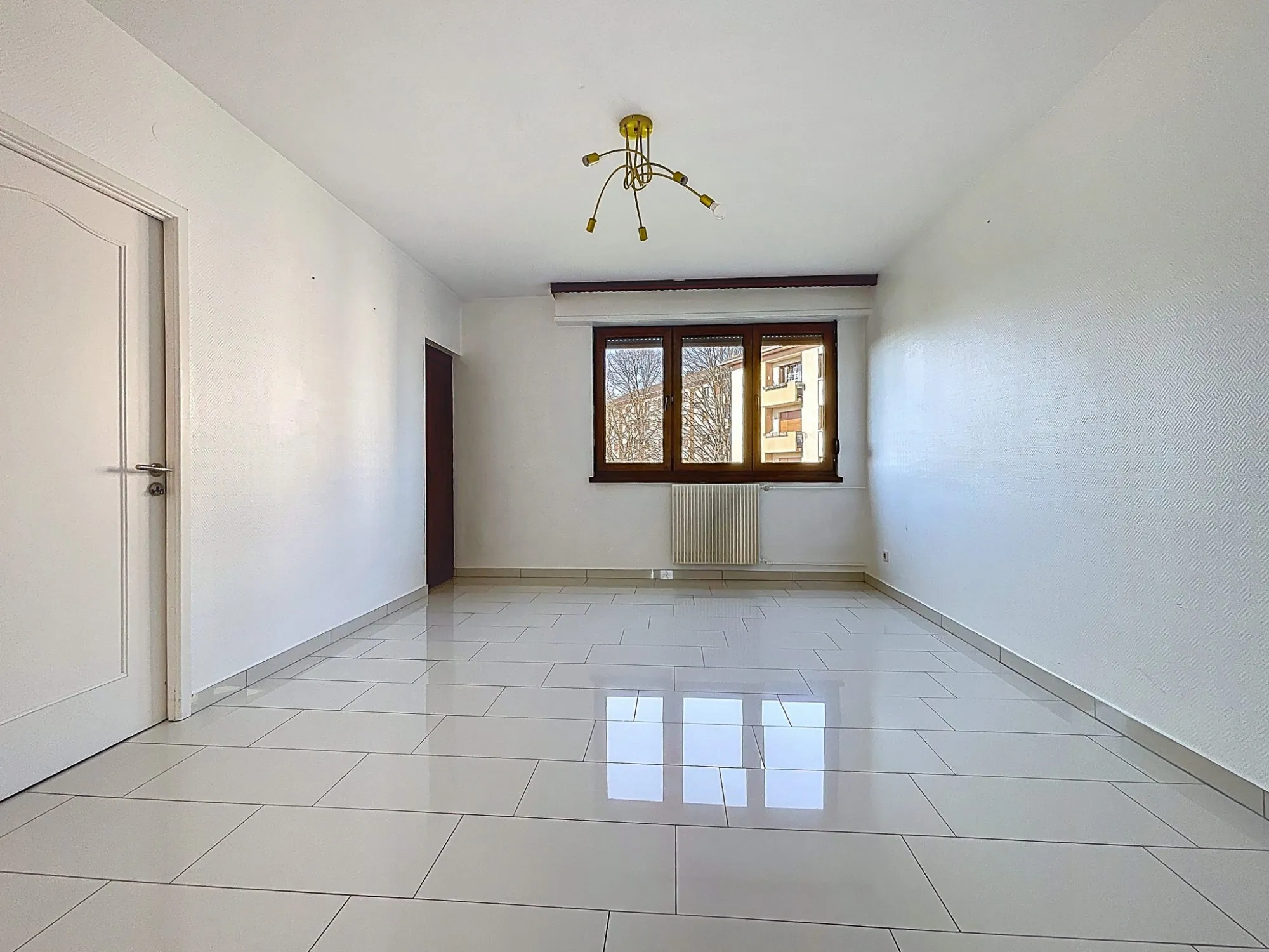 Appartement 4 pièces à Ostwald - 79,85 m² avec balcon, garage et cave 