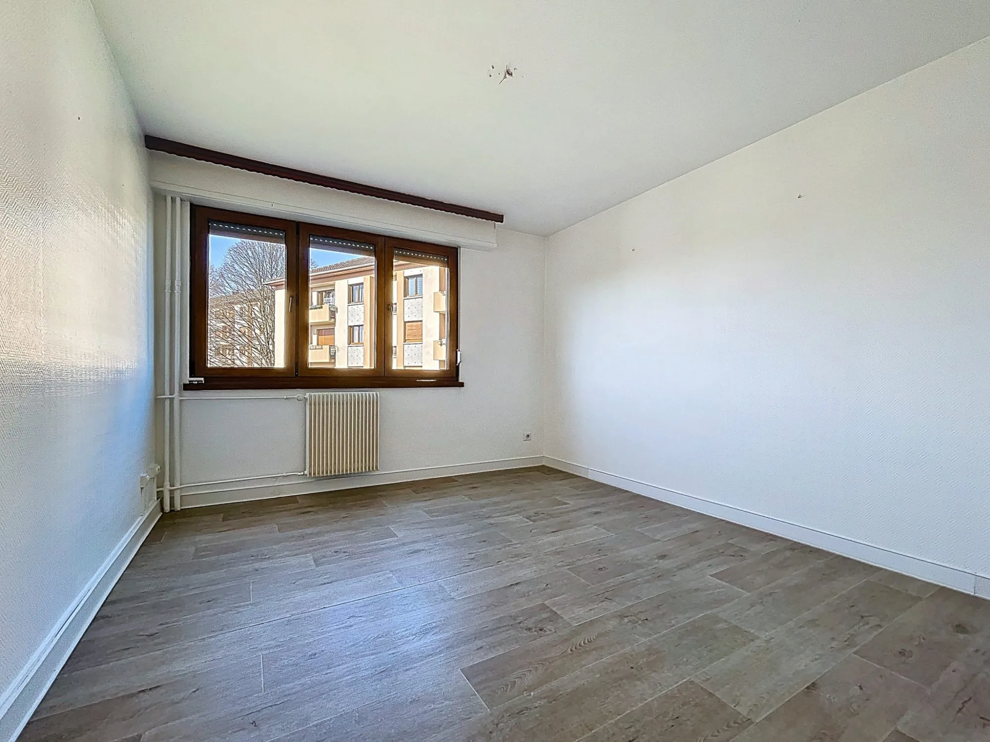 Appartement 4 pièces à Ostwald - 79,85 m² avec balcon, garage et cave 