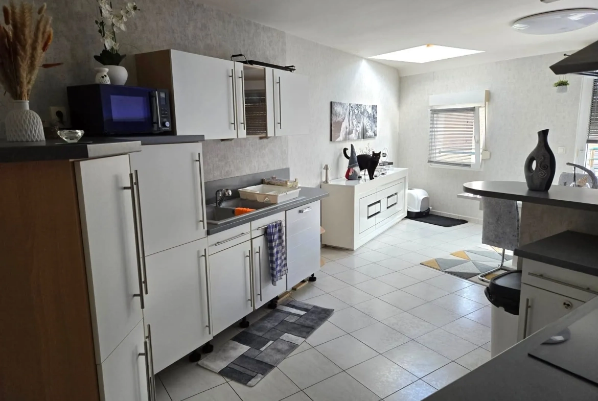 Appartement lumineux à vendre à Serrouville avec balcon et parking 