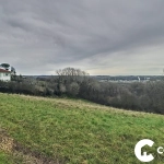 Terrain constructible à Lagor (64150) avec vue panoramique et potentiel de construction