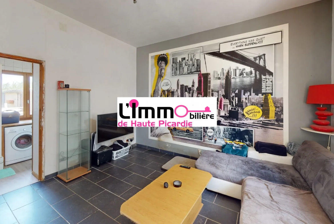 Salon avec meubles Maison à vendre à Chaulnes avec grand jardin, garage et terrasse - 2 chambres 