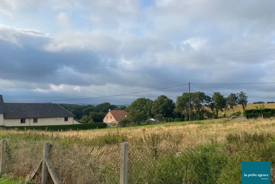 Grand terrain constructible à vendre à Esson, vue exceptionnelle sur la Suisse Normande 