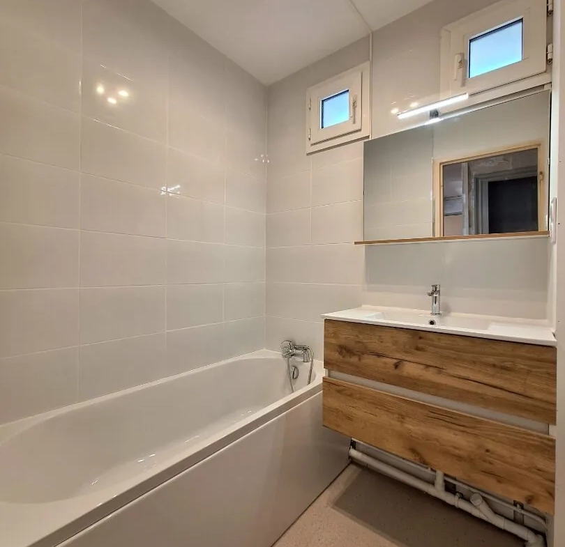 Appartement à Epinal de 4 pièces, 70 m² à rénover avec garage et cave 