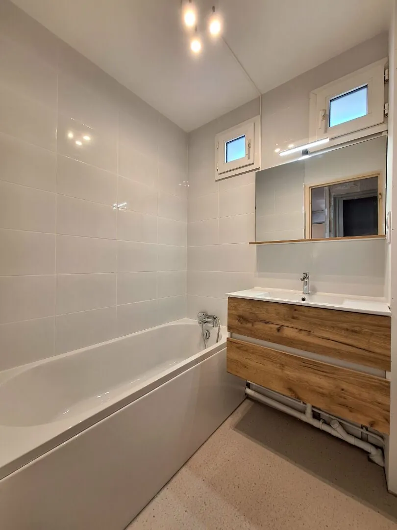 Appartement à Epinal de 4 pièces, 70 m² à rénover avec garage et cave 