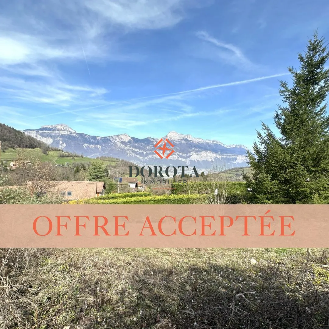 Terrain constructible de 602 m² avec vue sur la Chartreuse à La Combe-de-Lancey 