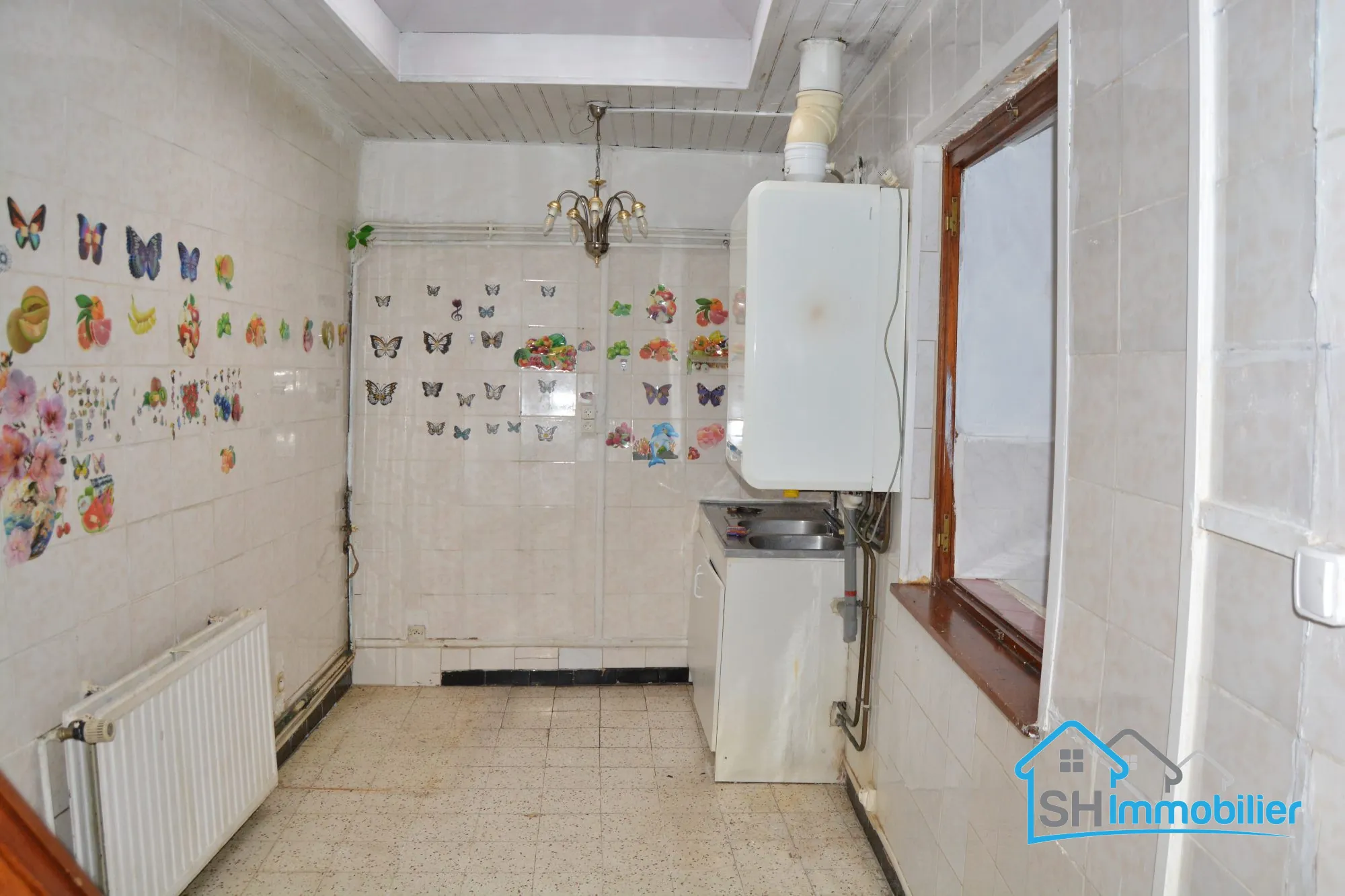 Maison à vendre à Roubaix avec potentiel de rénovation, proche du centre 