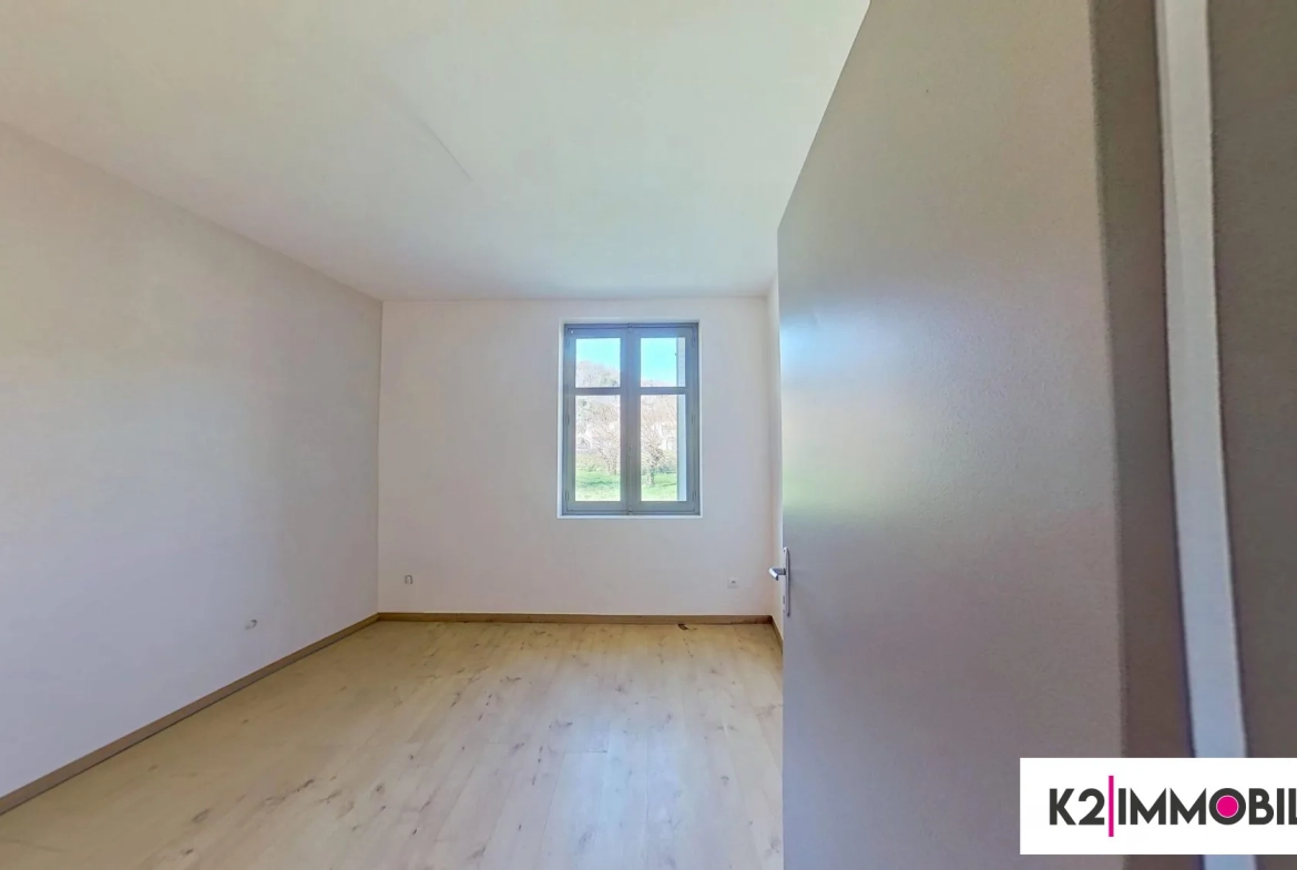 Maison mitoyenne de 97 m² avec terrasse, garage et jardin à Alissas 