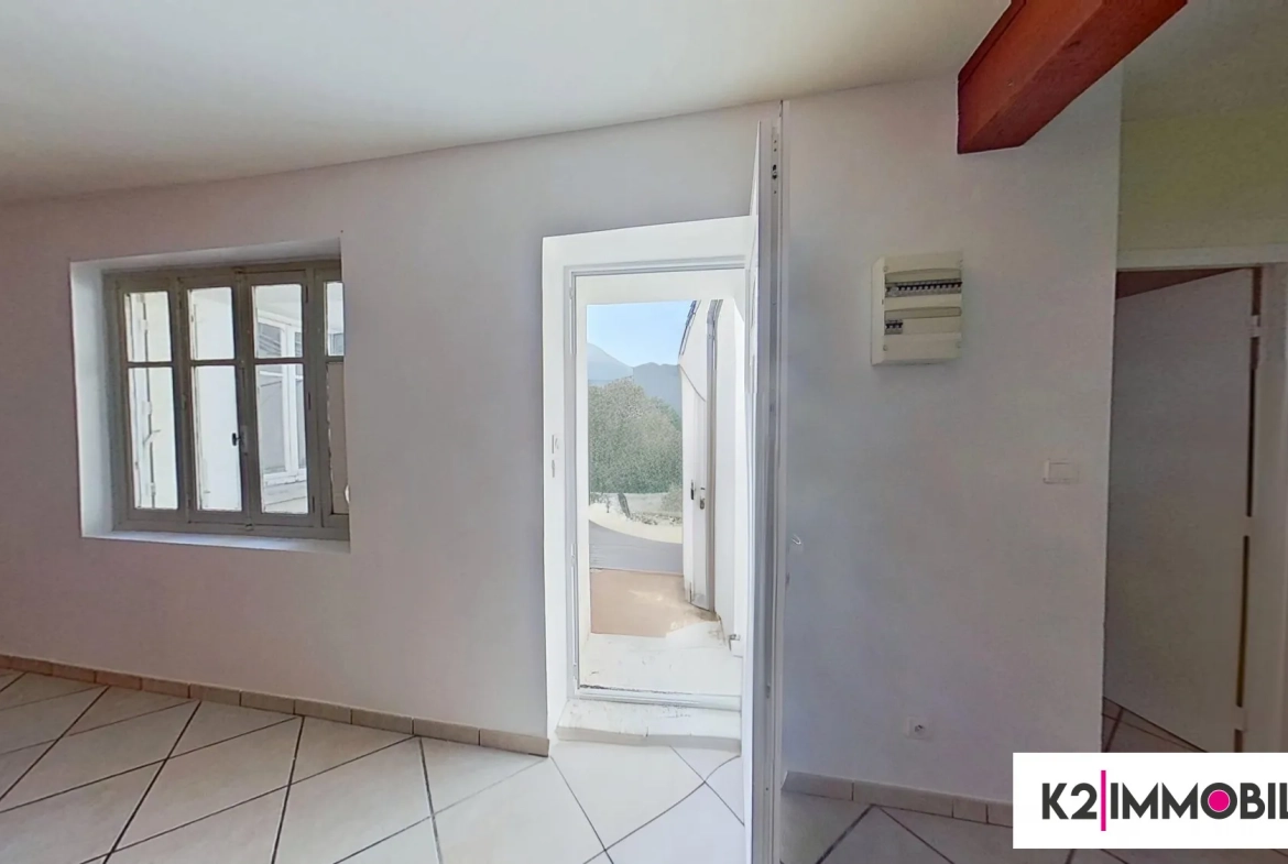 Maison mitoyenne de 97 m² avec terrasse, garage et jardin à Alissas 