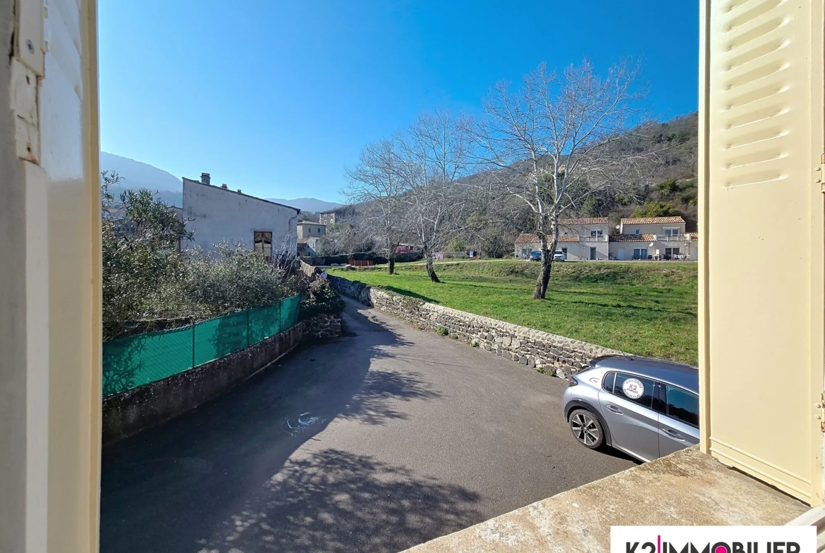 Maison mitoyenne de 97 m² avec terrasse, garage et jardin à Alissas 