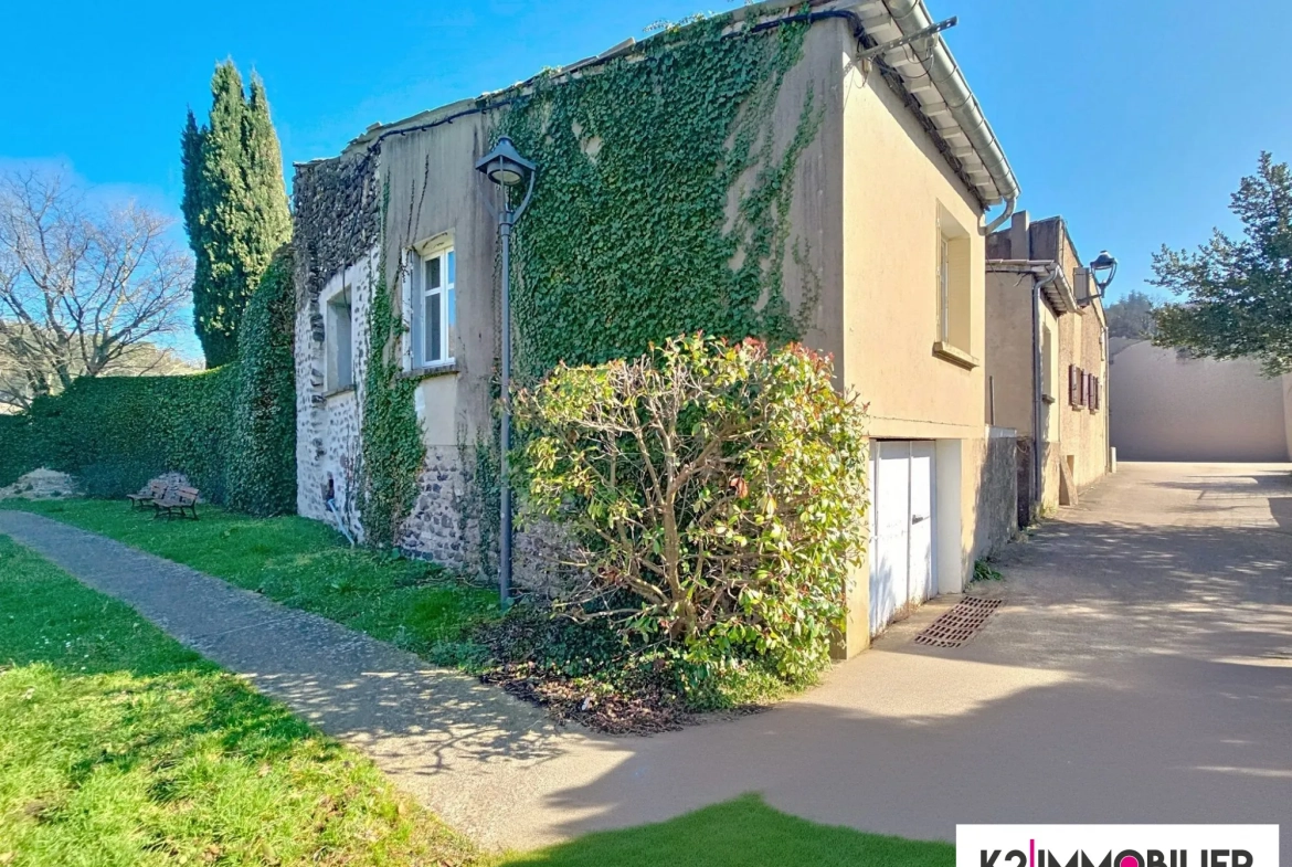 Maison mitoyenne de 97 m² avec terrasse, garage et jardin à Alissas 