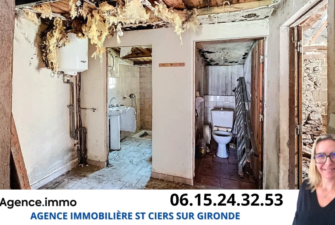 Maison en pierre à rénover à Reignac, cadre bucolique et grand terrain arboré 