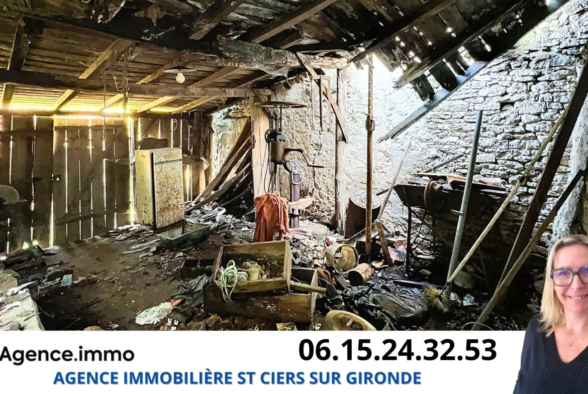 Maison en pierre à rénover à Reignac, cadre bucolique et grand terrain arboré 