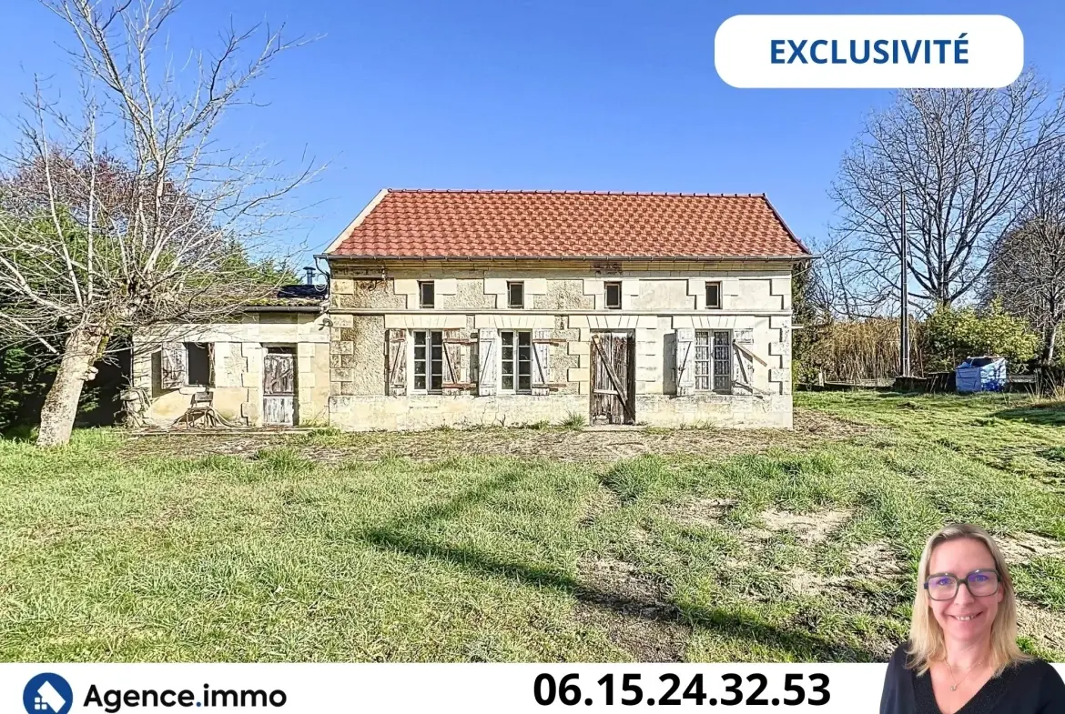 Maison en pierre à rénover à Reignac, cadre bucolique et grand terrain arboré 