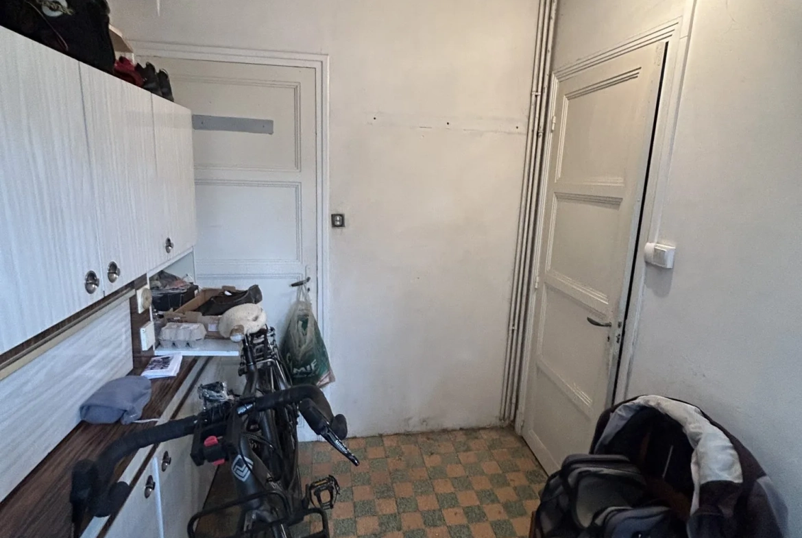 Maison à vendre à Quillan avec jardin, garage et cave en centre-ville 
