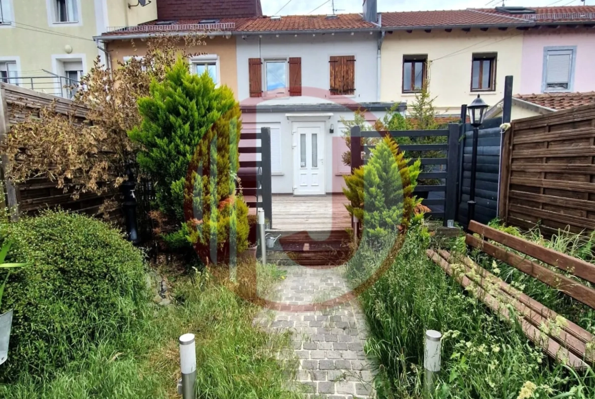 Maison rénovée à Mulhouse de 55 m² avec jardin et parking, parfait premier achat ou investissement locatif 