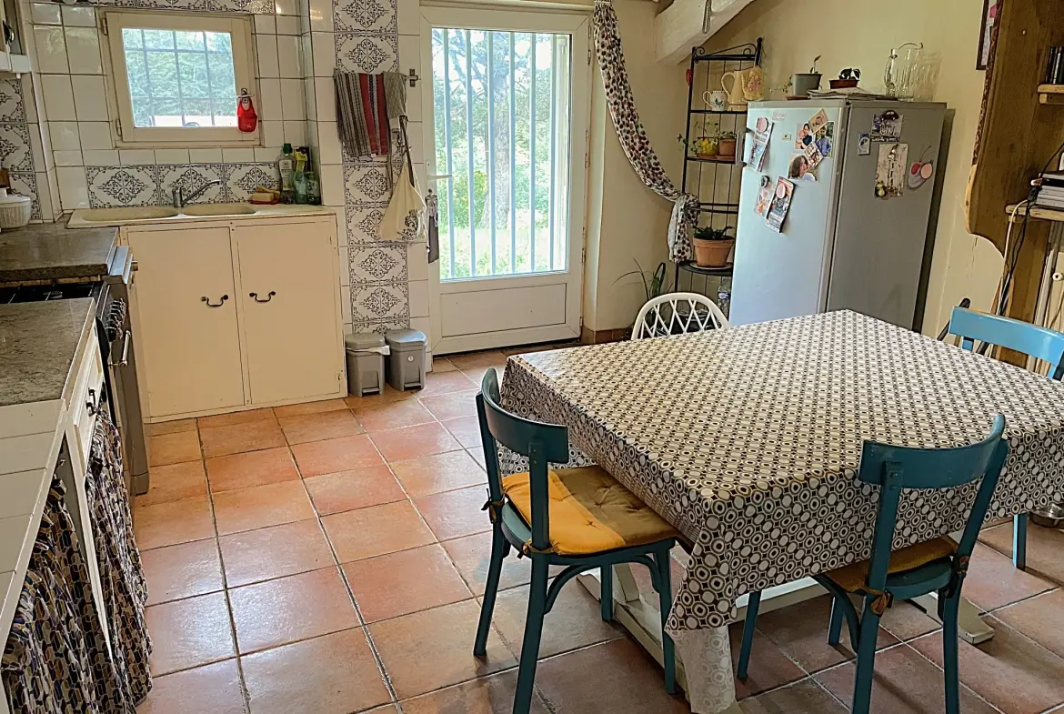Maison en pierre de 105 m² avec grange attenante à Lamothe Landerron 