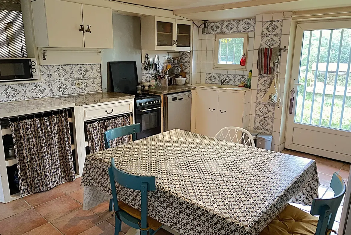 Maison en pierre de 105 m² avec grange attenante à Lamothe Landerron 