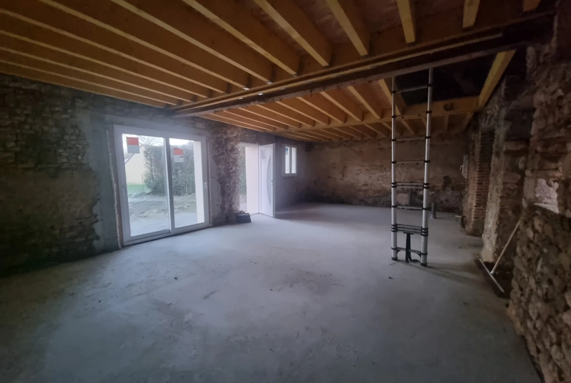 Maison à vendre entre Le Mêle Sur Sarthe et Sées avec garage et terrain de 600m² 