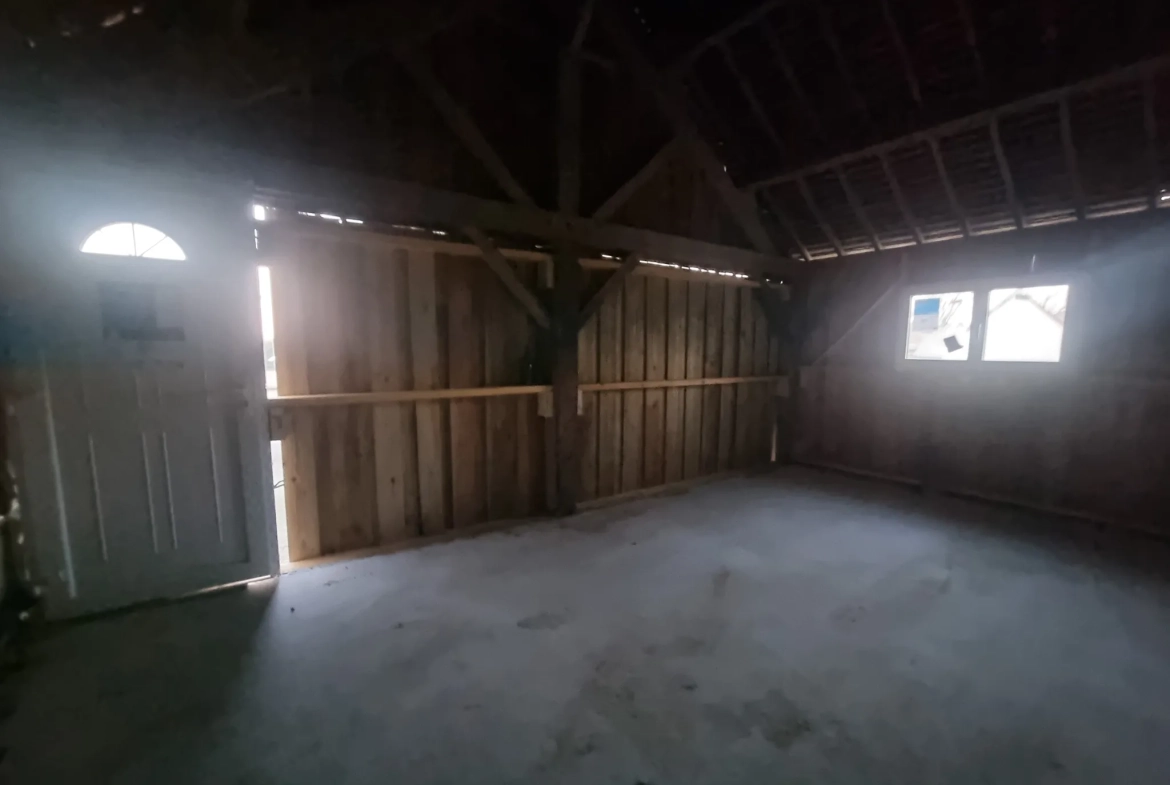 Maison à vendre entre Le Mêle Sur Sarthe et Sées avec garage et terrain de 600m² 