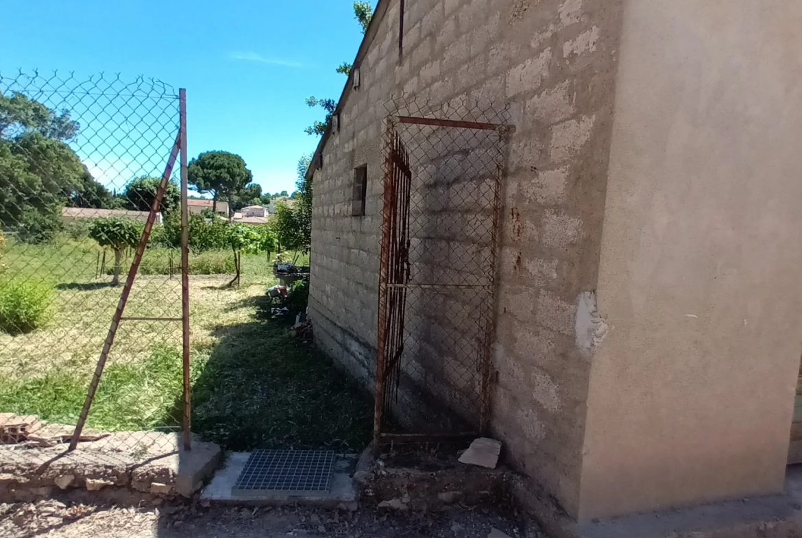 Terrain à bâtir de 408 m² à Magalas, proche écoles, avec garage 