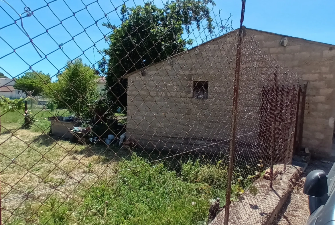 Terrain à bâtir de 408 m² à Magalas, proche écoles, avec garage 