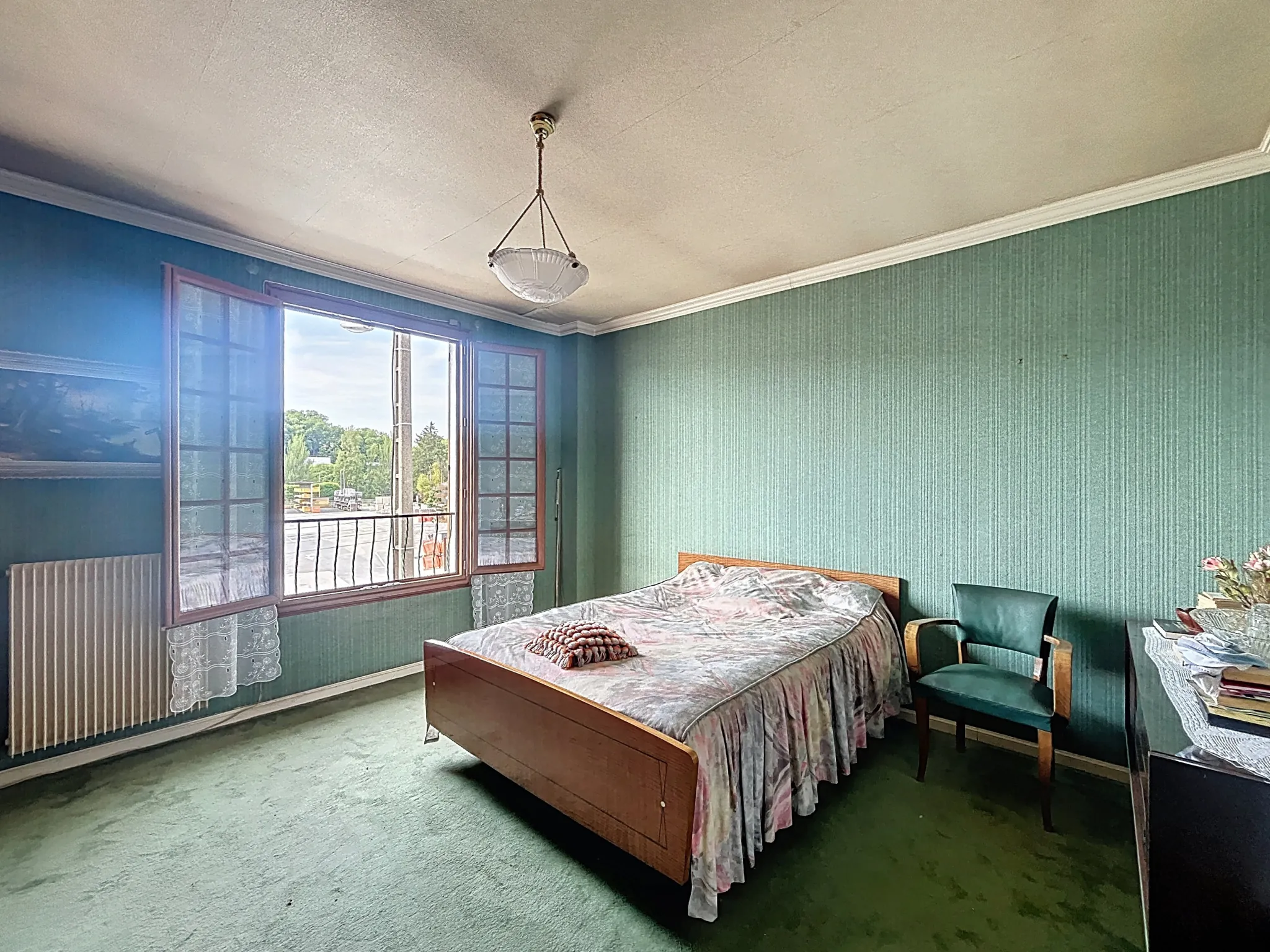 Appartement T4 à Melun avec travaux, balcon, cave et parking, proche gare 