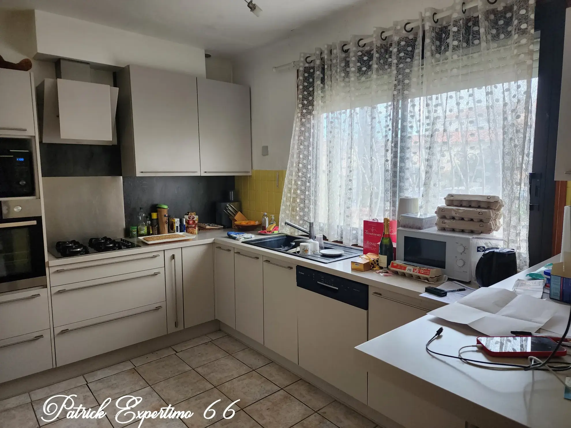 Maison à Perpignan de 115 m² avec piscine, jardin et grand garage - Opportunité d'investissement 