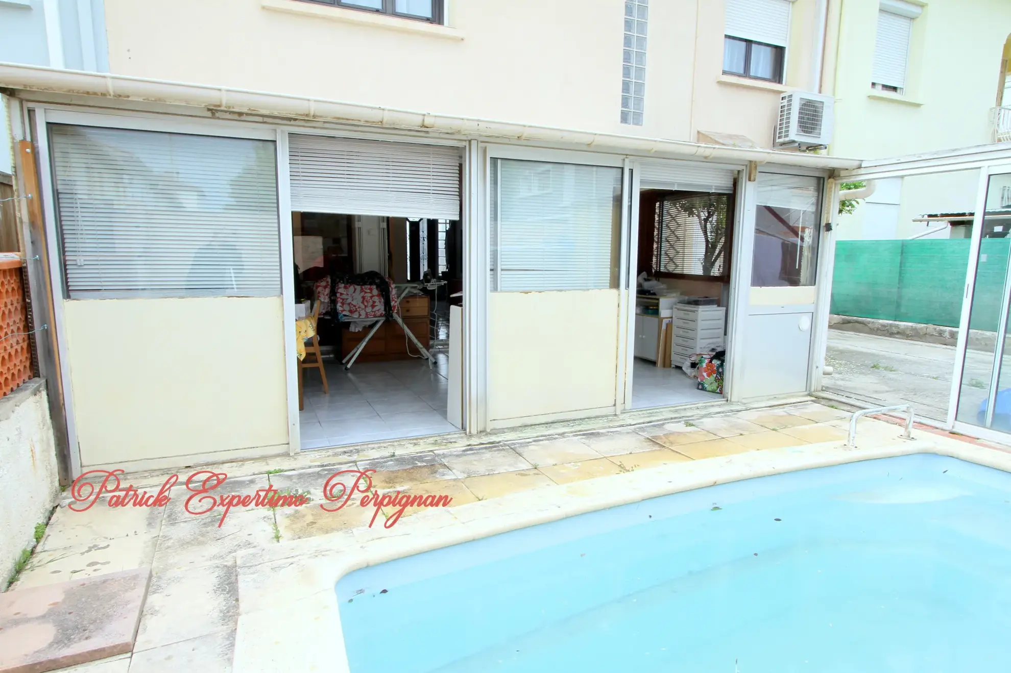 Maison à Perpignan de 115 m² avec piscine, jardin et grand garage - Opportunité d'investissement 