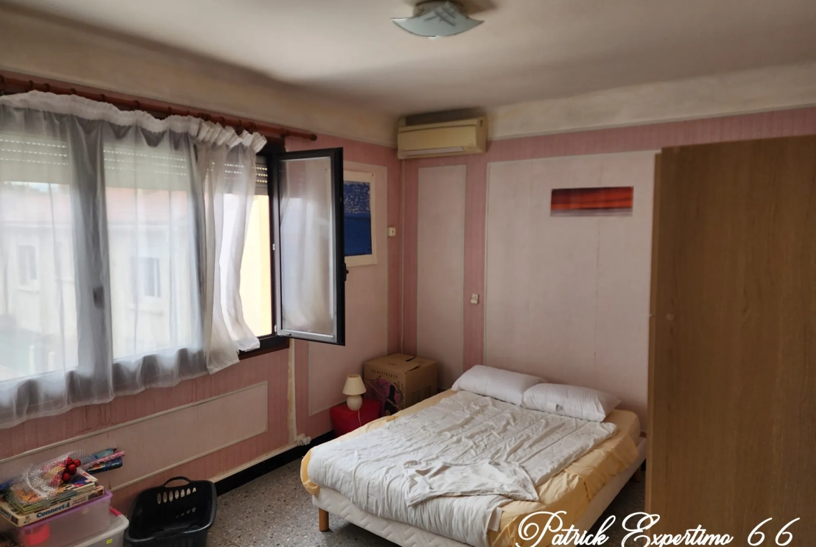 Maison à Perpignan de 115 m² avec piscine, jardin et grand garage - Opportunité d'investissement 