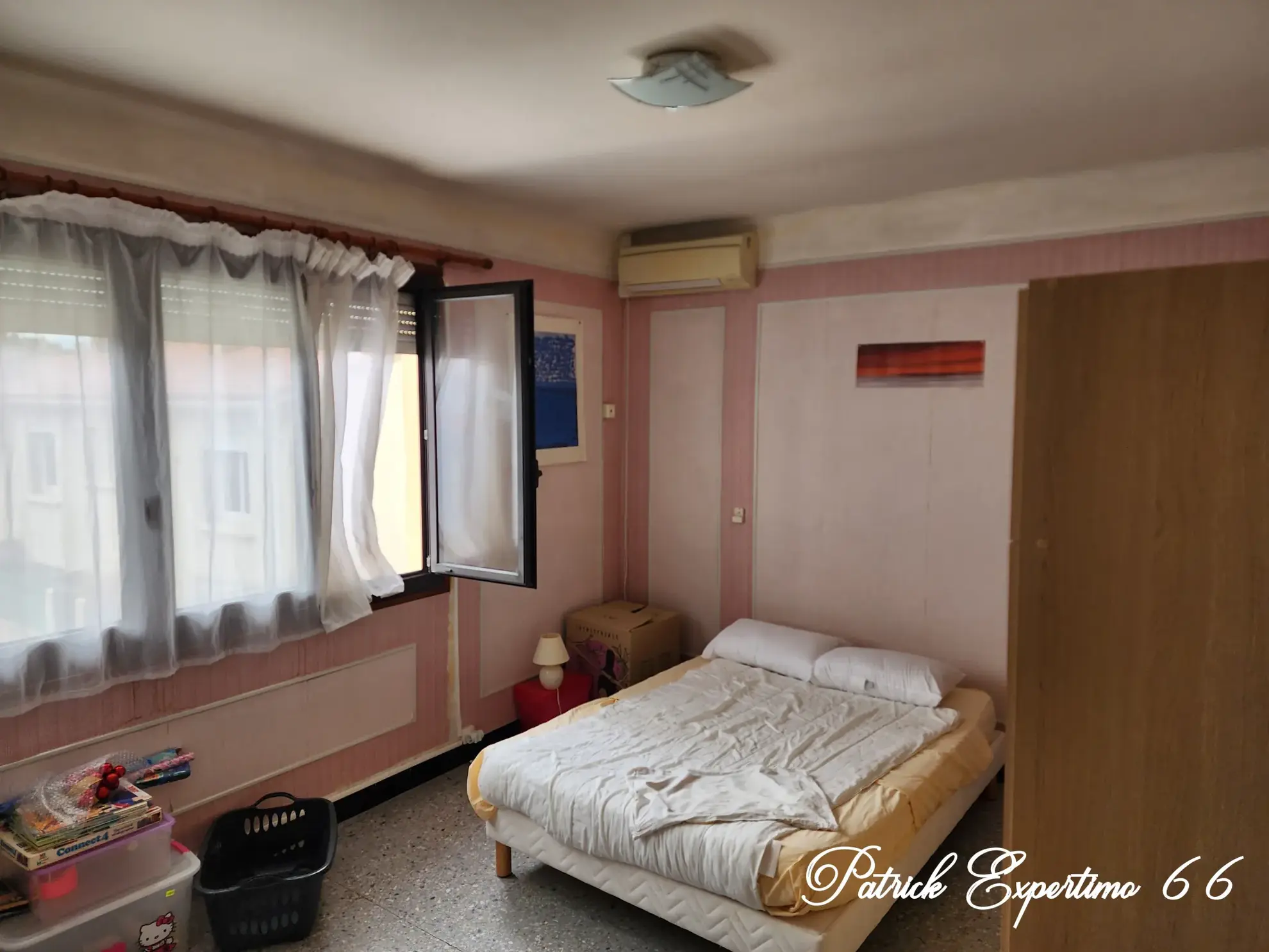 Maison à Perpignan de 115 m² avec piscine, jardin et grand garage - Opportunité d'investissement 