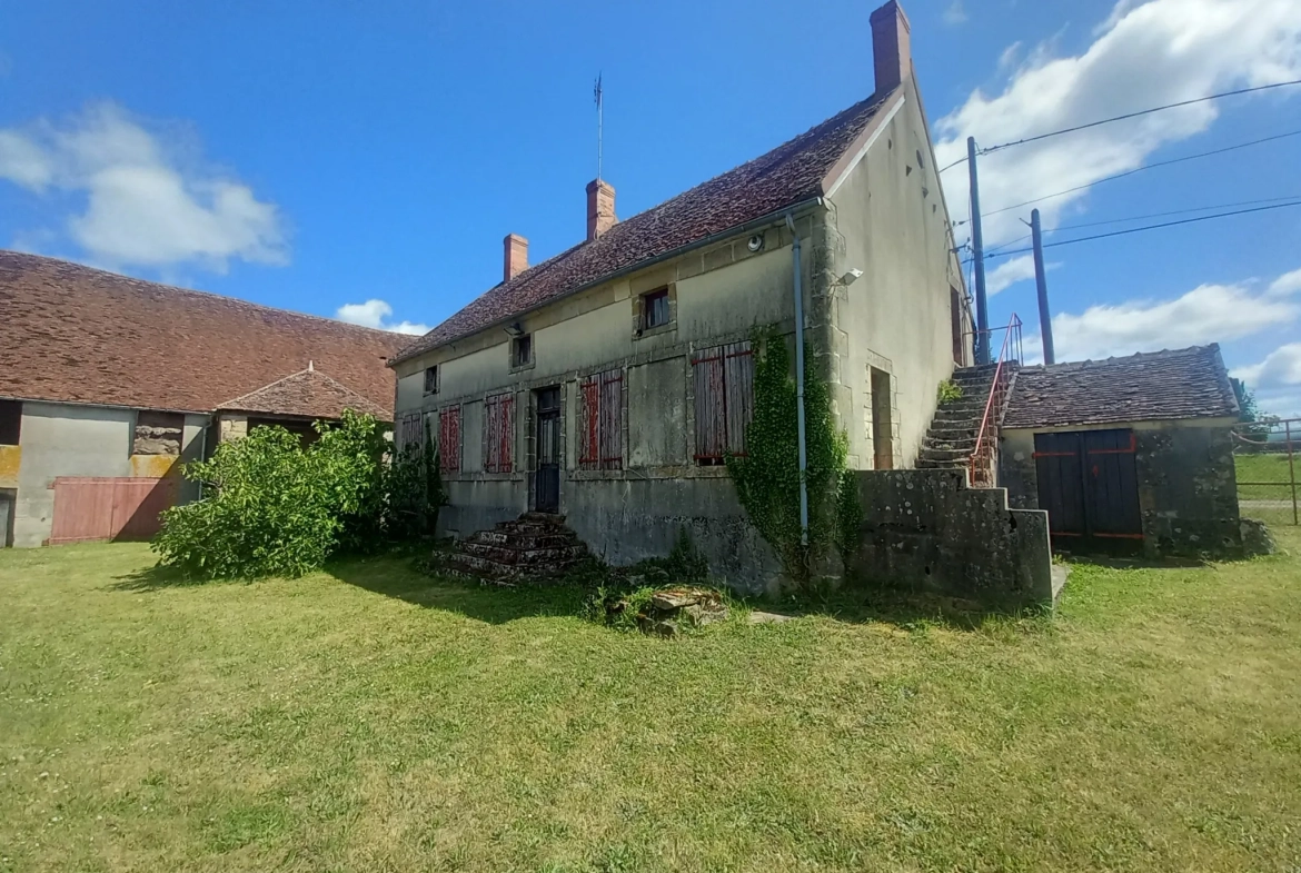 Fermette authentique à Lurcy-le-Bourg avec potentiel et vue panoramique 