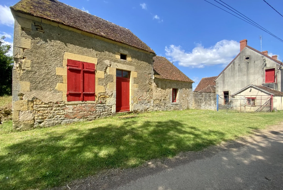 Fermette authentique à Lurcy-le-Bourg avec potentiel et vue panoramique 