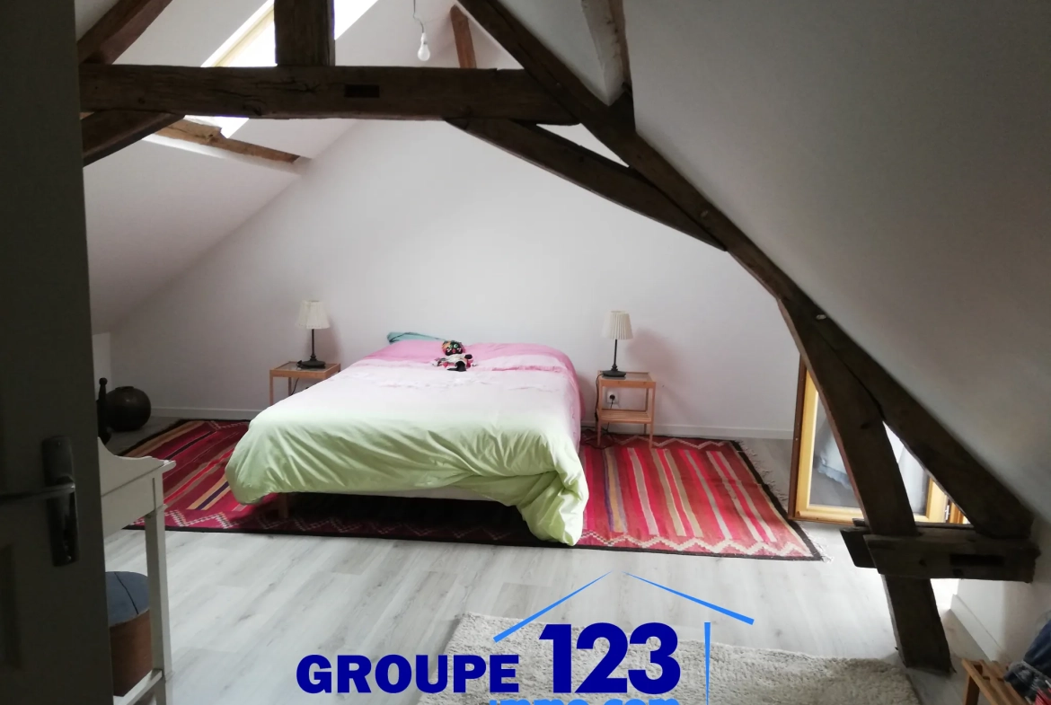 Charmante maison de plain-pied avec jardin dans un village proche de Paris 