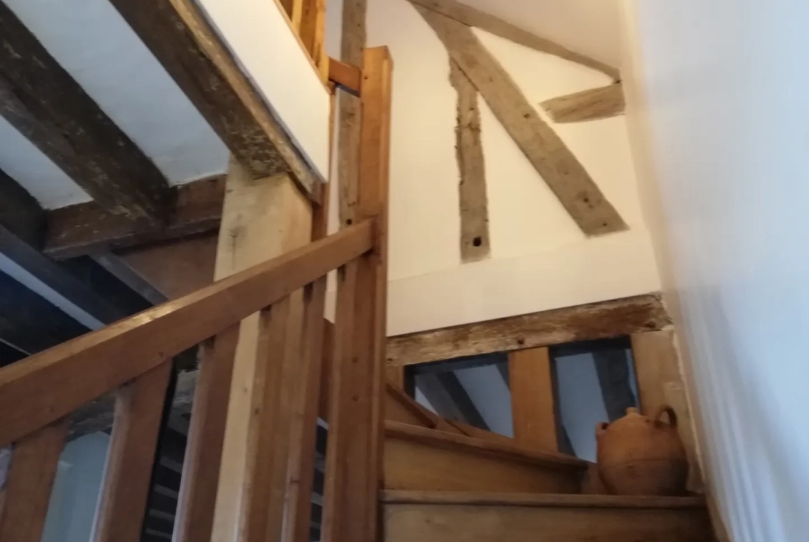 Charmante maison de plain-pied avec jardin dans un village proche de Paris 