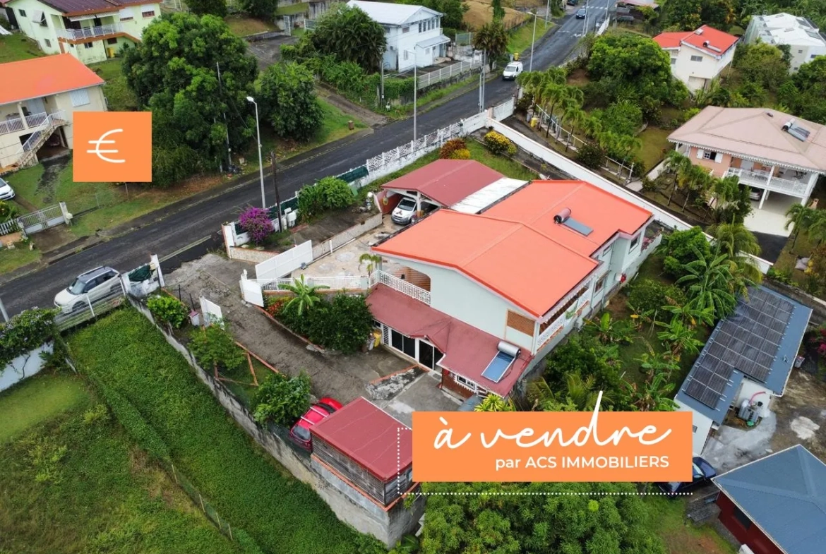 Appartement F3 à vendre à Ducos avec jardin, 2 chambres, terrasse et stationnement sécurisé 