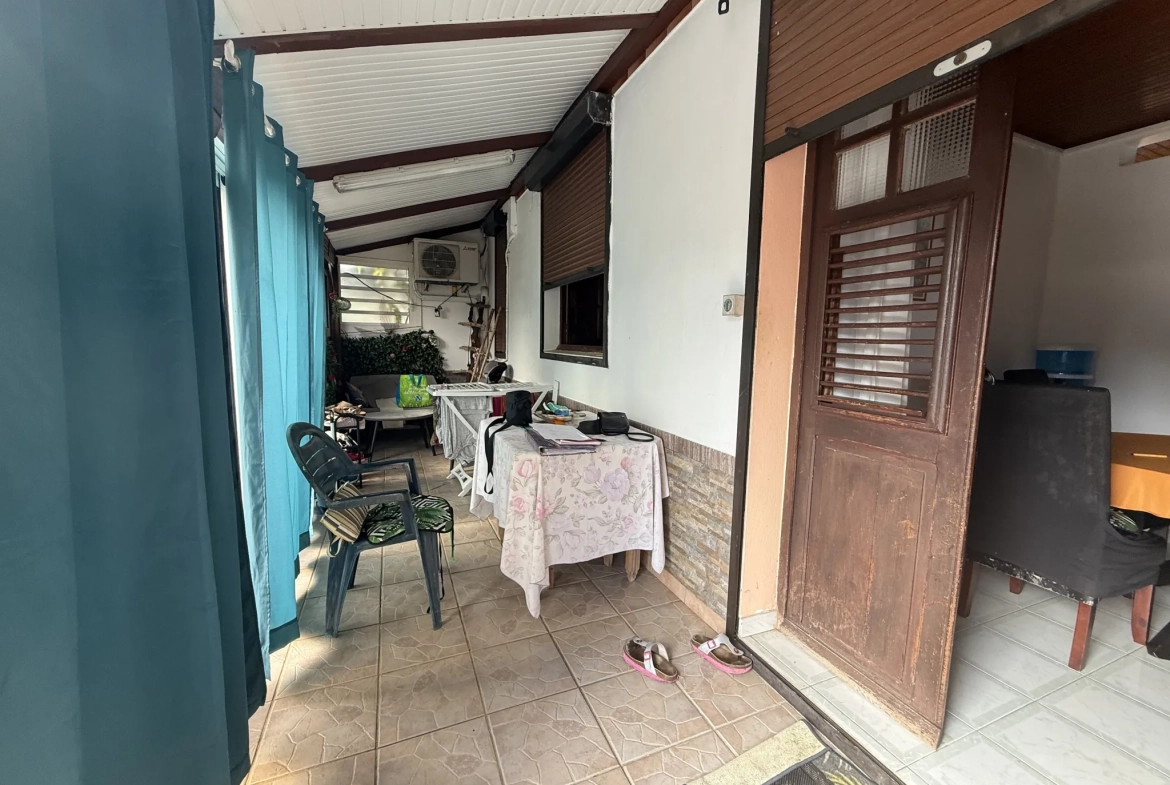 Appartement F3 à vendre à Ducos avec jardin, 2 chambres, terrasse et stationnement sécurisé 