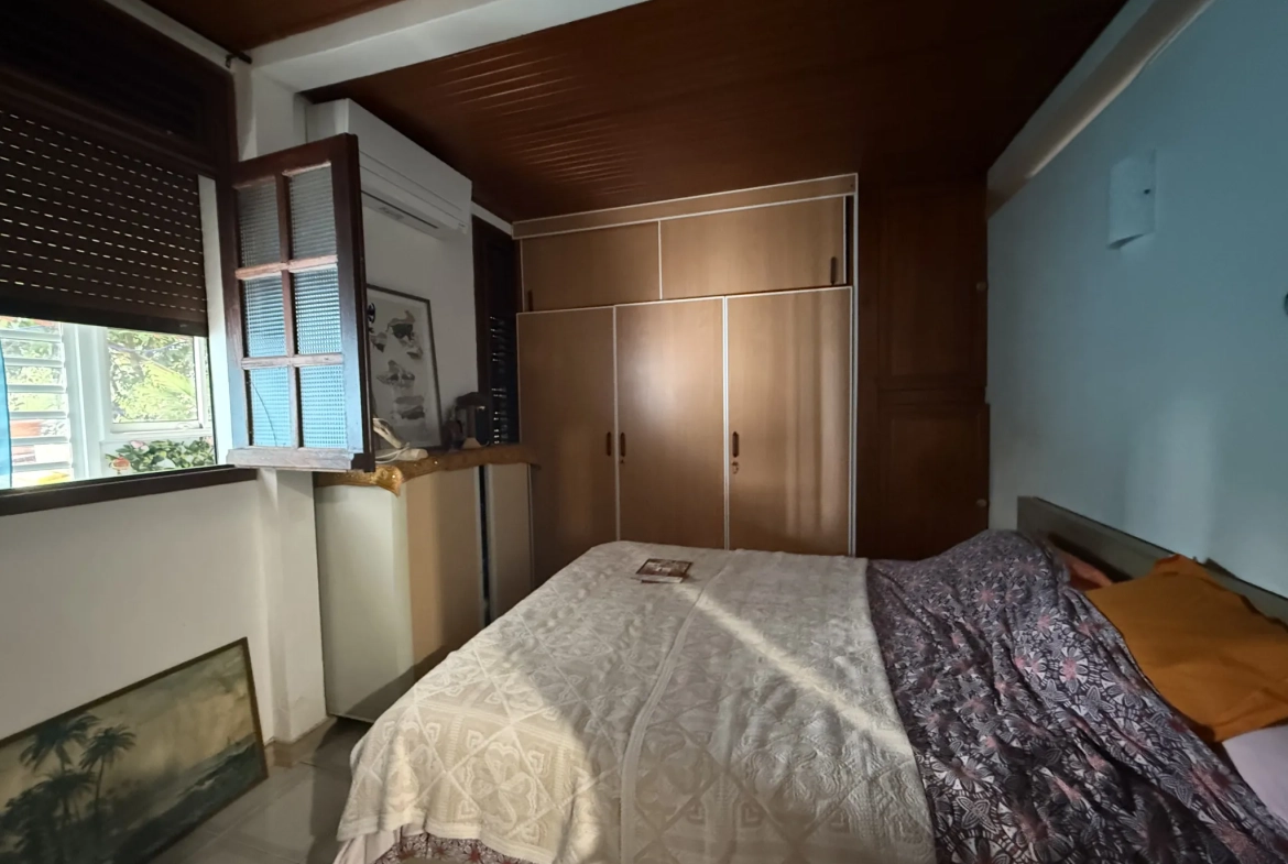 Appartement F3 à vendre à Ducos avec jardin, 2 chambres, terrasse et stationnement sécurisé 