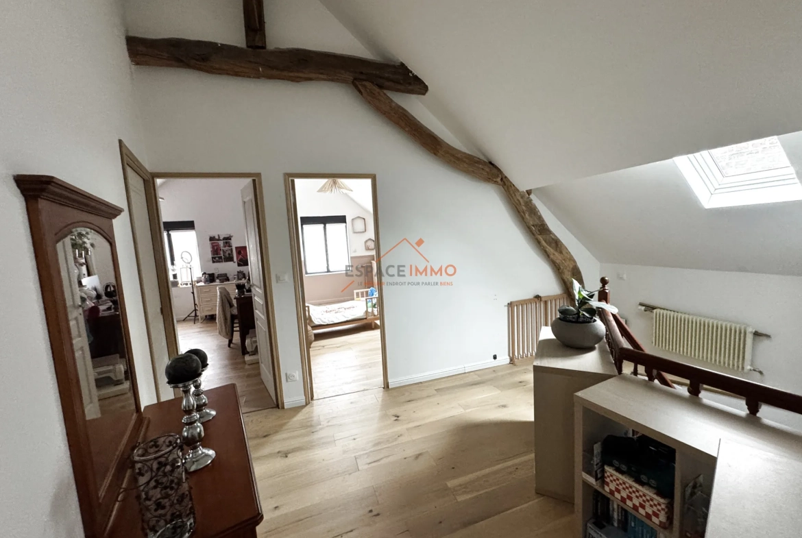 Maison rénovée à Wallers avec 3 chambres, jardin clos et garages - Opportunité à saisir 