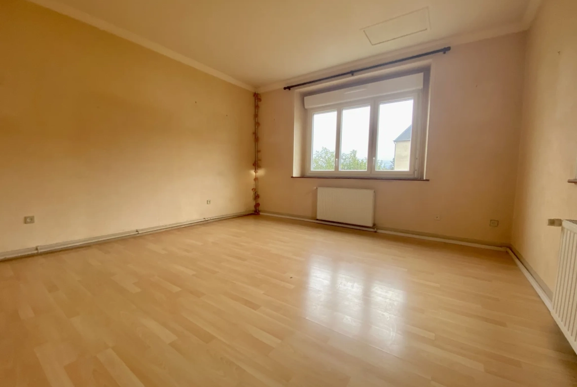 Maison mitoyenne à Vierzon 89m² avec jardin et garage - Opportunité à saisir 