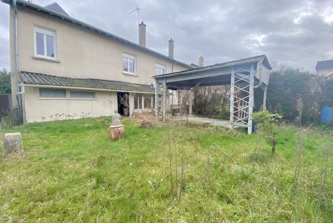 Maison mitoyenne à Vierzon 89m² avec jardin et garage - Opportunité à saisir 