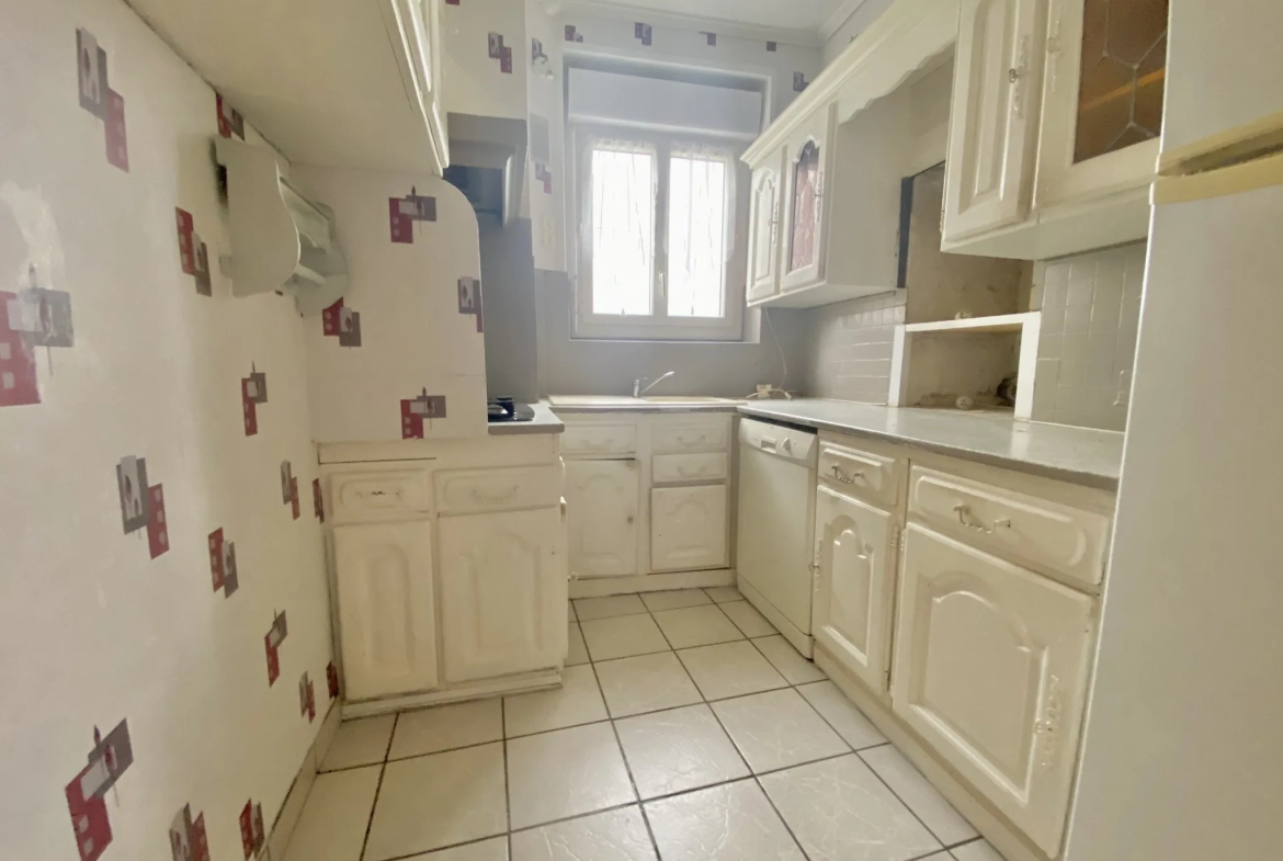 Maison mitoyenne à Vierzon 89m² avec jardin et garage - Opportunité à saisir 