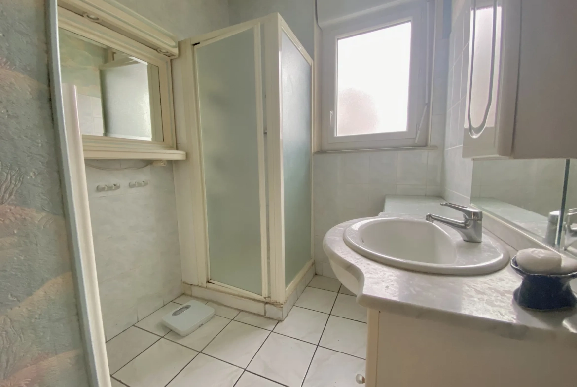Maison mitoyenne à Vierzon 89m² avec jardin et garage - Opportunité à saisir 