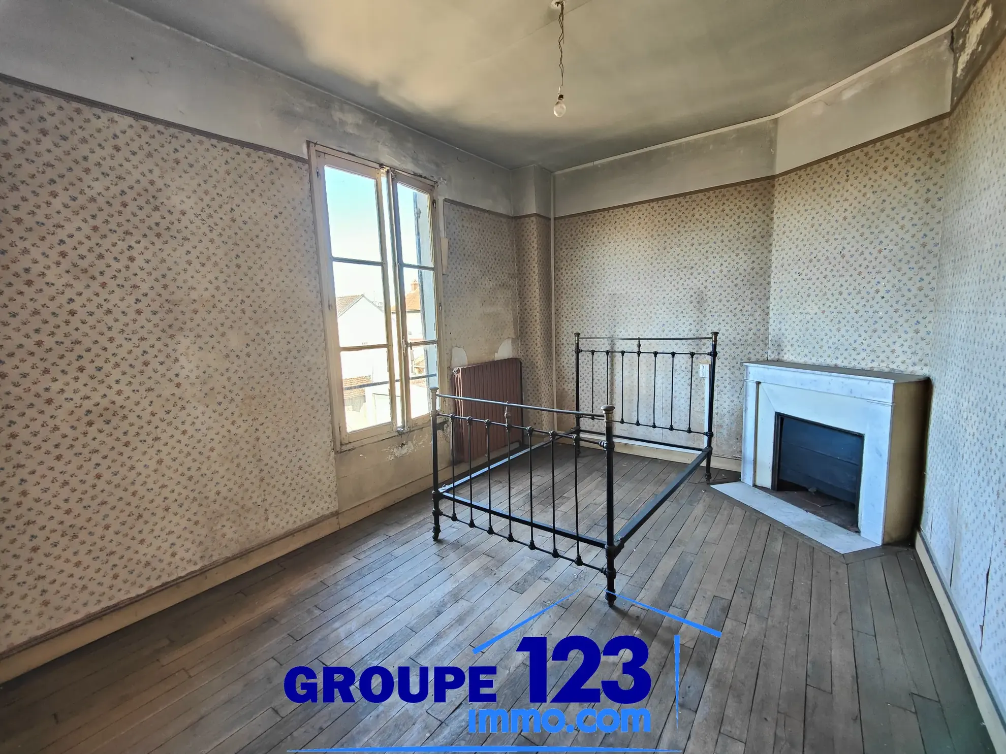Maison à rénover à Migennes avec jardin et grande potentiel, proche gare et centre-ville 