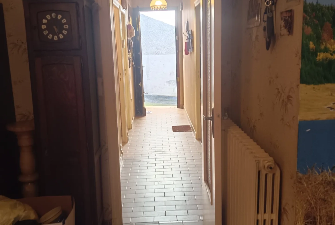 Maison de ville à vendre à Tulle avec cave et combles aménageables 