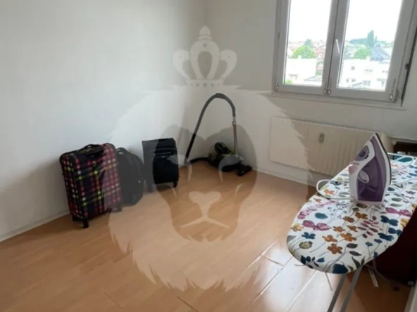Bel appartement 4 pièces à Mulhouse avec parking et balcon, idéal famille ou investissement 