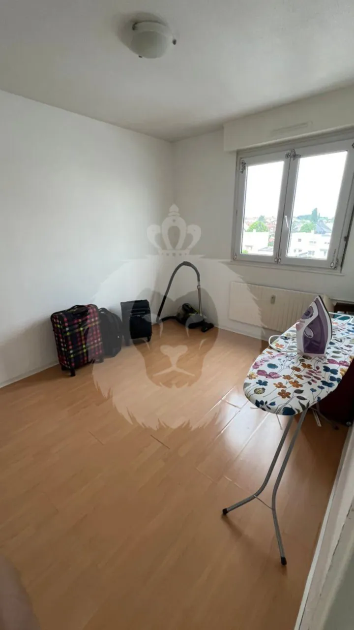 Bel appartement 4 pièces à Mulhouse avec parking et balcon, idéal famille ou investissement 