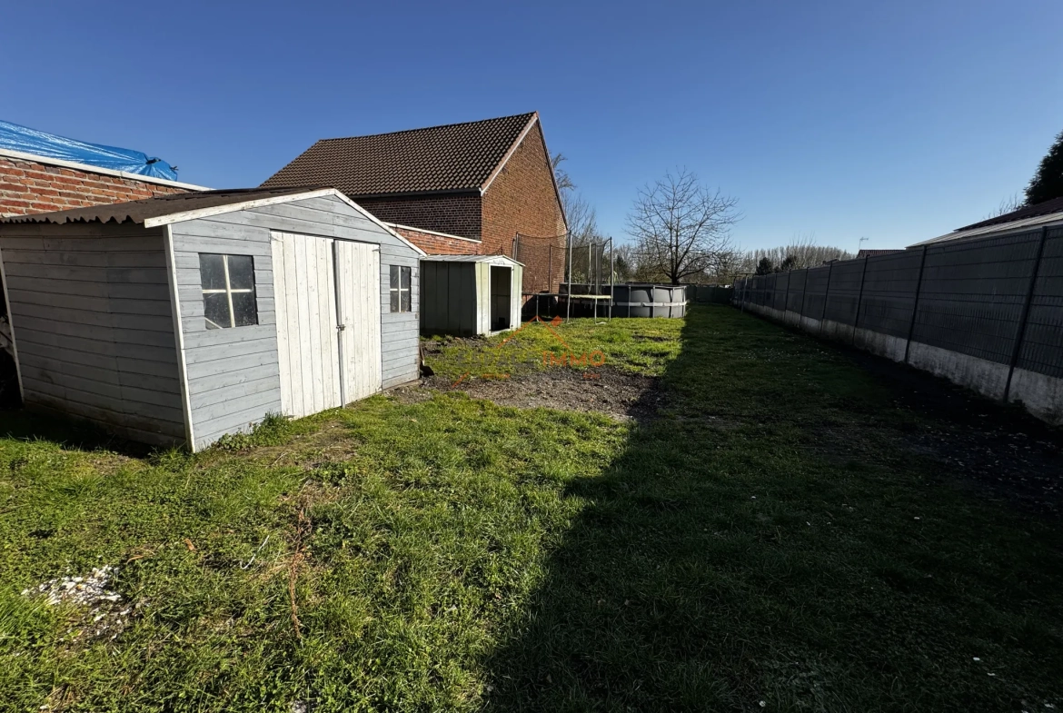 Maison semi-individuelle rénovée à Roeulx avec jardin et garage 